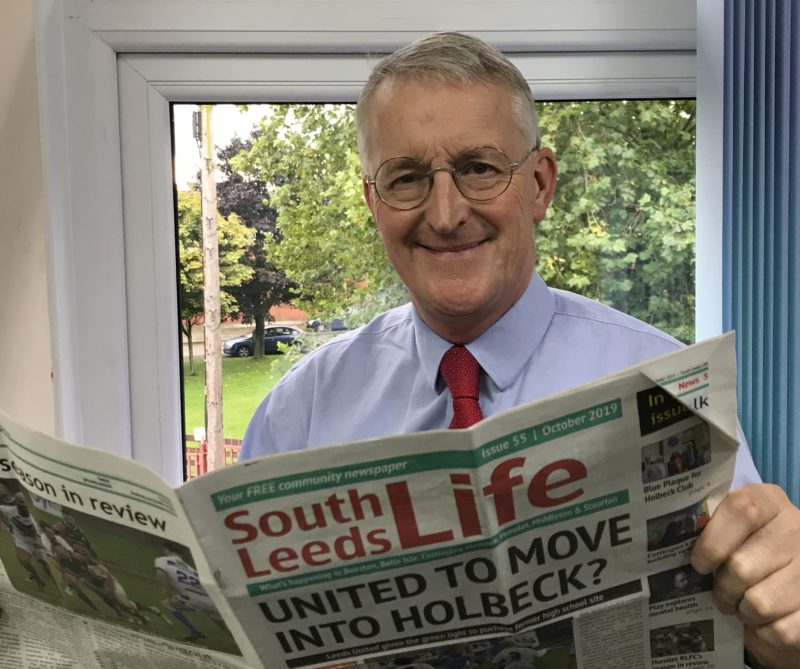 Hilary reading South Leeds Life newspaper