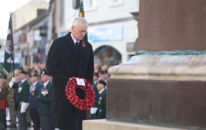 Hilary laying a wreath at the war memorial in Enniskillen on Remembrance Sunday