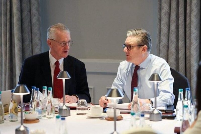 Hilary with the Prime Minister on his recent visit to Belfast for talks with Northern Ireland Party leaders
