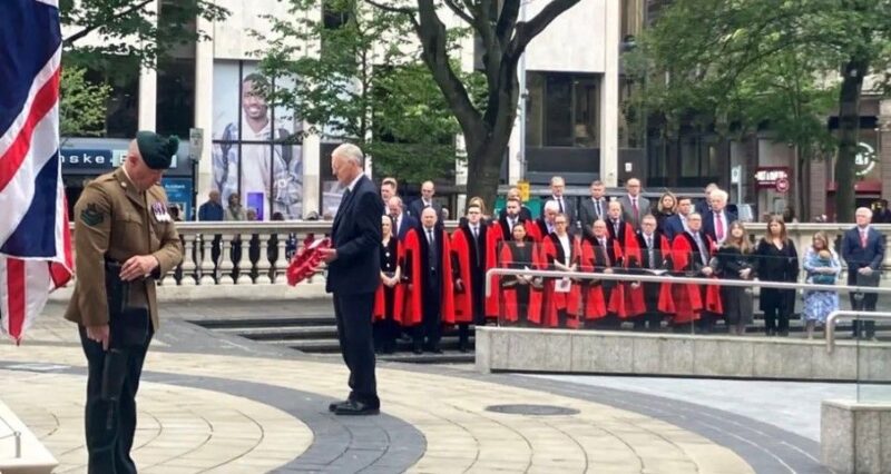Hilary laying a wreath in Belfast to commemorate all those who died  on The Somme in 1916 